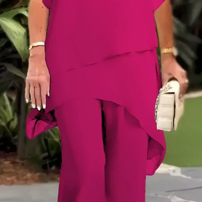 EB Conjunto elegante con top asimétrico y pantalones de pierna ancha.